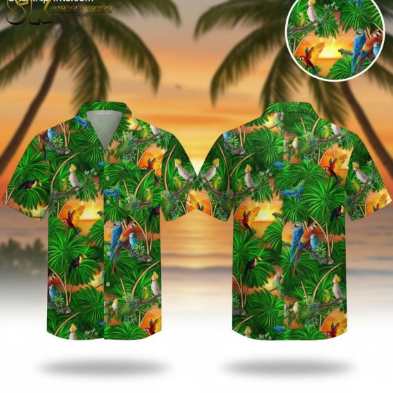 Mens green Hawaiian shirt featuring colorful parrots and toucans among palm leaves with sunset background