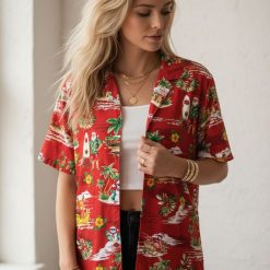Men's hawaiian christmas shirt showcasing holiday tropical pattern with Santa, reindeer, hibiscus flowers and palm trees in bright colors