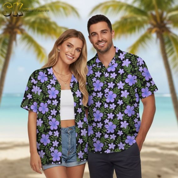 Mens purple hawaiian shirt with various purple flowers and green leaf details on black fabric