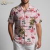 Pink flamingo hawaiian shirt displaying flamingo birds with tropical island scenery on pink fabric