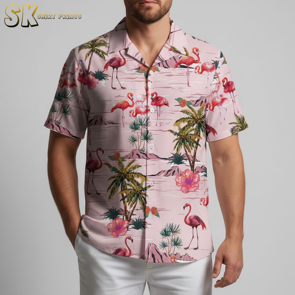 Pink flamingo hawaiian shirt displaying flamingo birds with tropical island scenery on pink fabric
