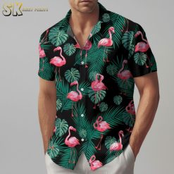 Pink flamingo Hawaiian shirt with scattered flamingos and green tropical foliage on black fabric