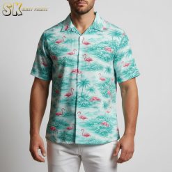 Pink flamingo hawaiian shirt with tropical landscape and palm tree background