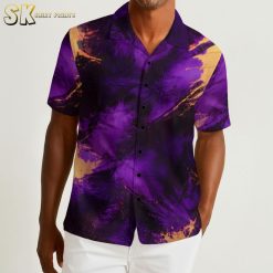 Purple aloha shirt displaying abstract swirl pattern with dark colors and orange splatter effects throughout fabric