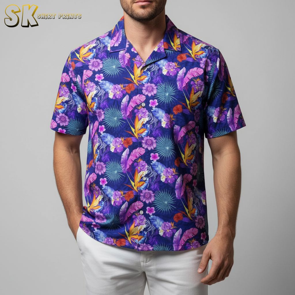 Purple aloha shirt displaying Bird of Paradise flowers in orange and yellow with purple tropical foliage