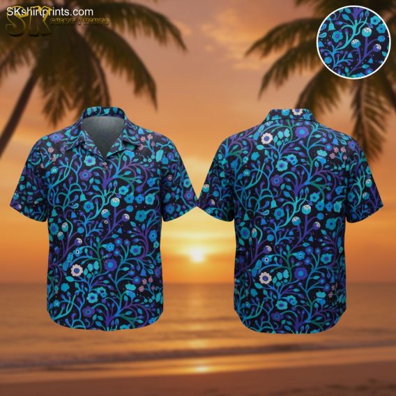 Purple and blue Hawaiian shirt featuring colorful flowers, leaves and small birds on dark background