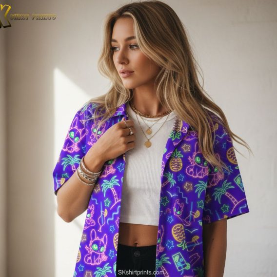 Purple and gold Hawaiian shirt showcasing surfboards, tropical patterns, and bright gold accents