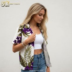 Purple flower Hawaiian shirt showcasing large botanical blooms with green tropical leaves in repeating design