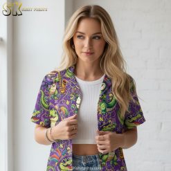 Purple tropical shirt featuring cartoon alligator playing saxophone with decorative feathers and party accessories