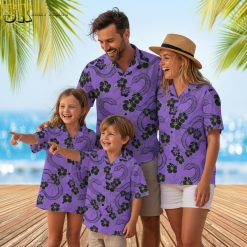 Purple tropical shirt with black snakes winding through hibiscus flowers and tropical leaves