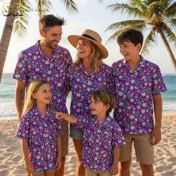Purple tropical shirt with ukulele and fern leaf design elements on purple background