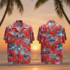 Man wearing red tropical shirt with palm tree and sailboat print in casual lifestyle setting