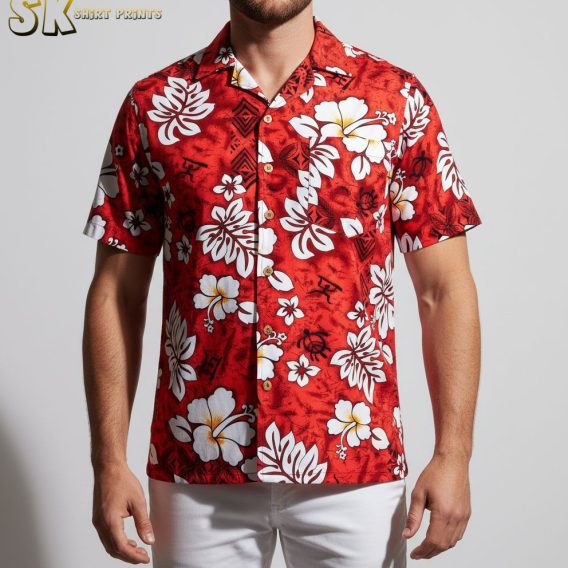 Close-up detail of red white and blue Hawaiian shirt showing white hibiscus flowers and tribal design elements