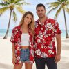 Red white blue Hawaiian shirt with hibiscus print worn outdoors showcasing tropical vacation style