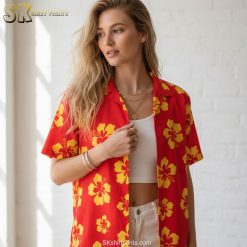 Red yellow Hawaiian shirt in bright colors featuring yellow hibiscus with red centers