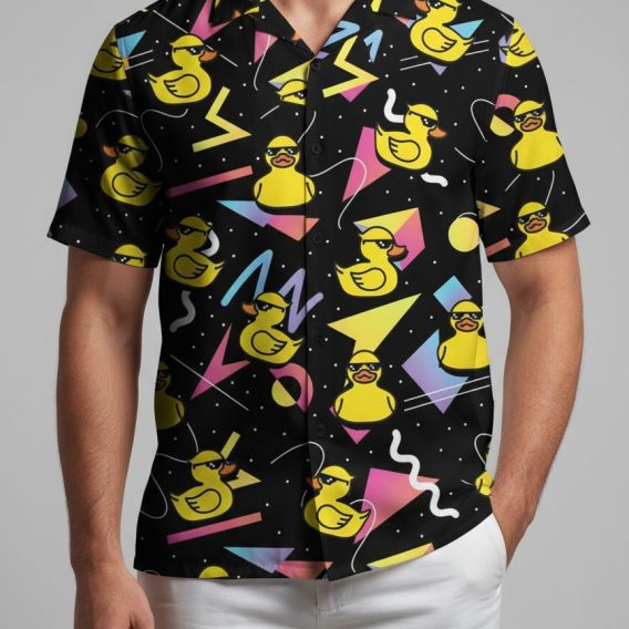 Rubber duck hawaiian shirt displaying colorful ducky pattern with triangles and circles on dark fabric
