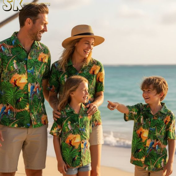 Sage green Hawaiian shirt with exotic bird print showing parrots and toucans nestled in tropical palm foliage