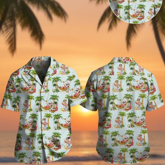 Santa Hawaiian shirt featuring Santa Claus relaxing in hammock between palm trees with surfboards and flamingos