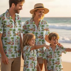 Santa tropical shirt displaying Santa in hammock with decorative string lights and beach themed elements