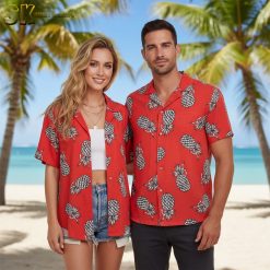 Tom Selleck style red Hawaiian shirt with detailed pineapple graphics