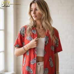 Tom Selleck red shirt displaying stylized pineapple artwork