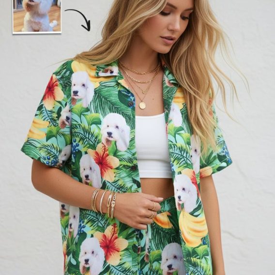 Tropical dog shirt featuring white fluffy dog pattern with red yellow hibiscus flowers and tropical elements