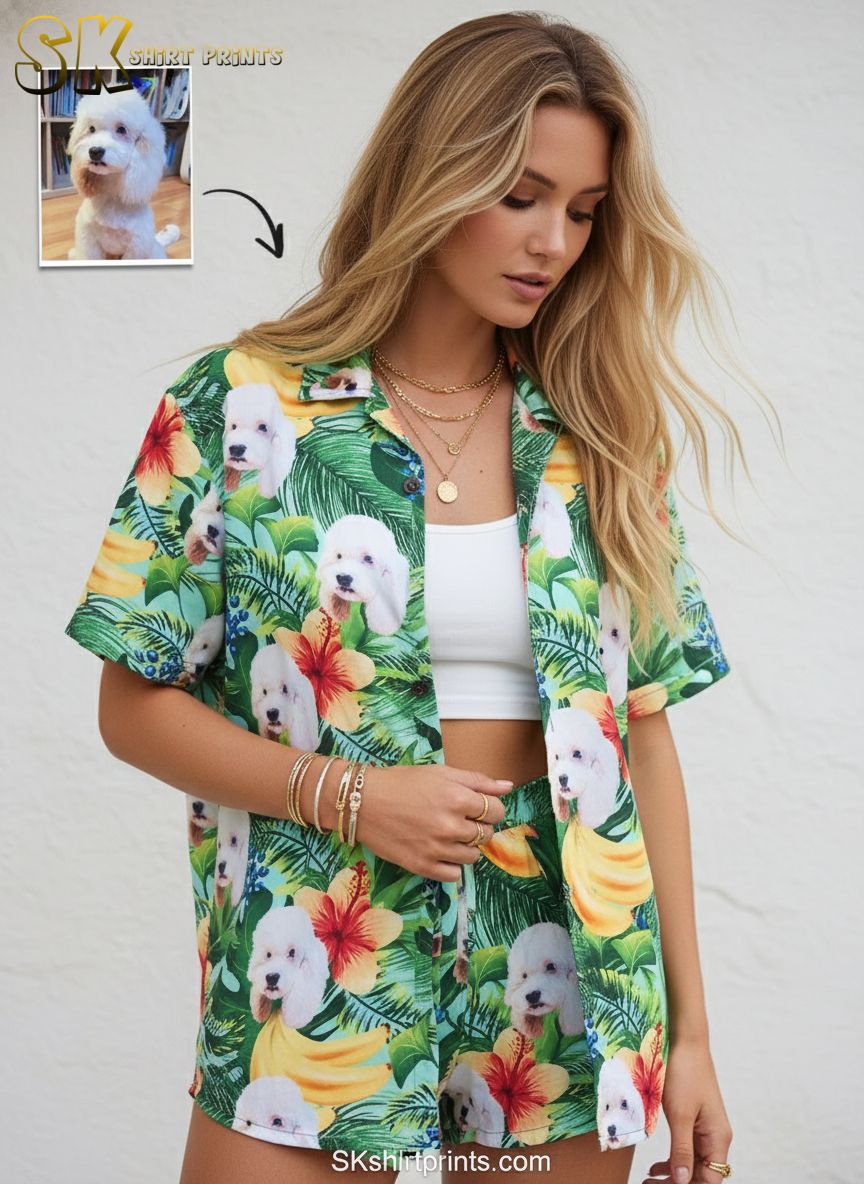 Tropical dog shirt featuring white fluffy dog pattern with red yellow hibiscus flowers and tropical elements