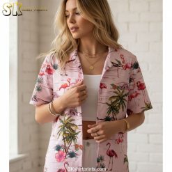 Tropical flamingo shirt featuring flamingo birds with small island and water motifs on pink background