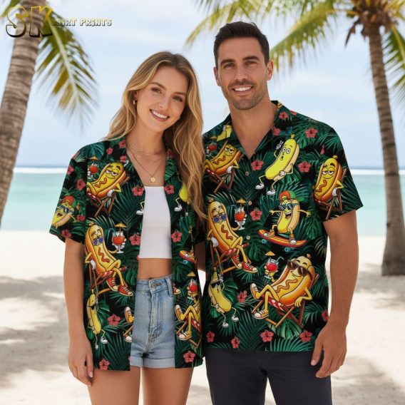 White and green Hawaiian shirt with hot dog mascots holding drinks among tropical flowers