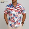 White Hawaiian button up shirt with American flag hibiscus pattern and patriotic design elements