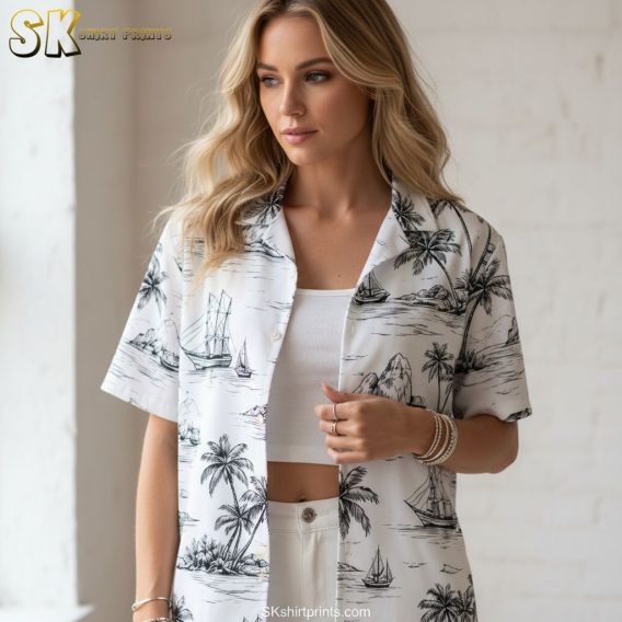 White Hawaiian shirt with blue palm trees showing product specifications and sizing information