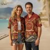 250th anniversary Hawaiian shirt with America 250 text, Statue of Liberty, eagle, Liberty Bell, stars, waves, and palm tree floral print in red, gold, and blue