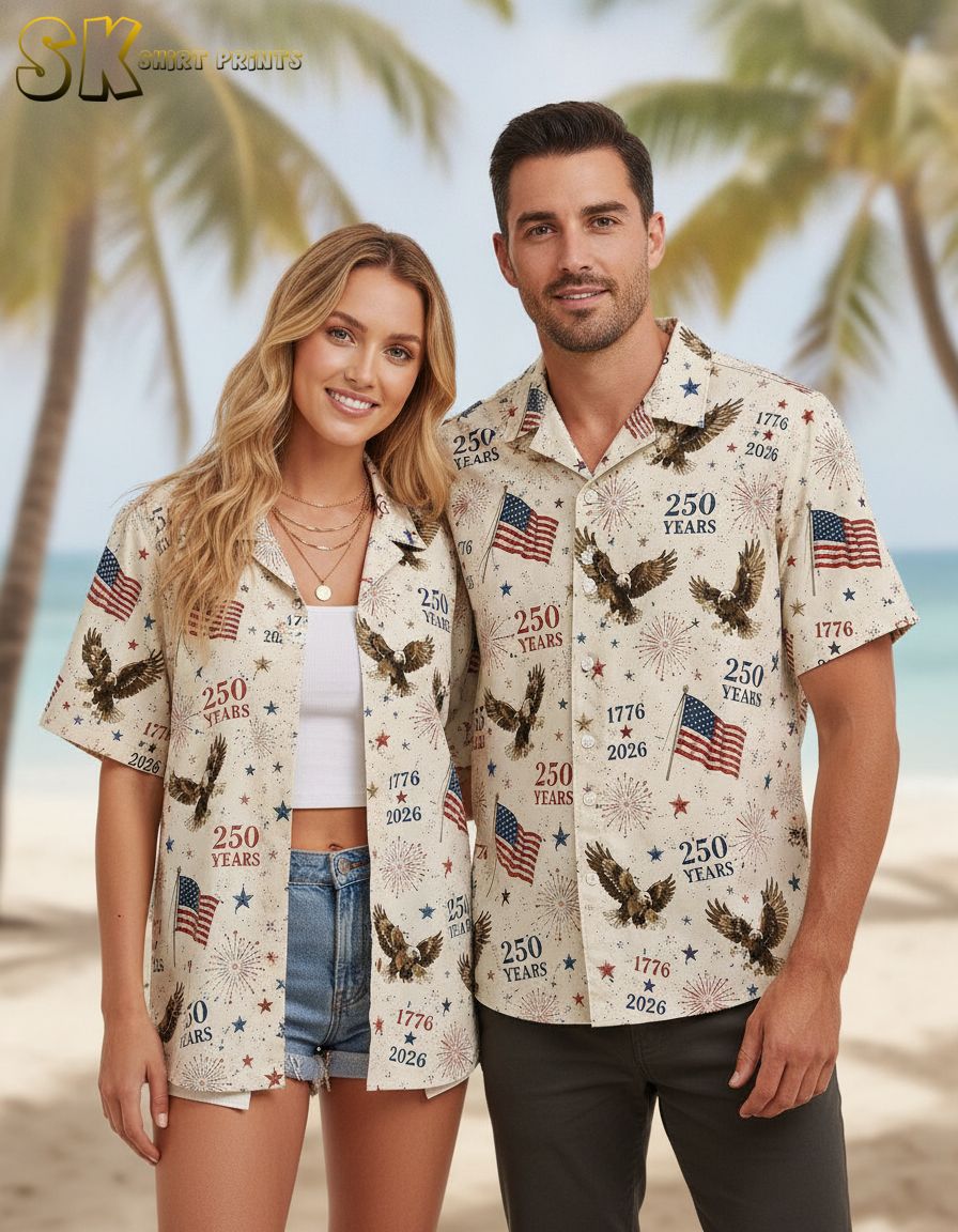 America 250 Hawaiian shirt with all-over print of bald eagles, American flags, fireworks, stars, and the years 1776 and 2026 in red, white, and blue.
