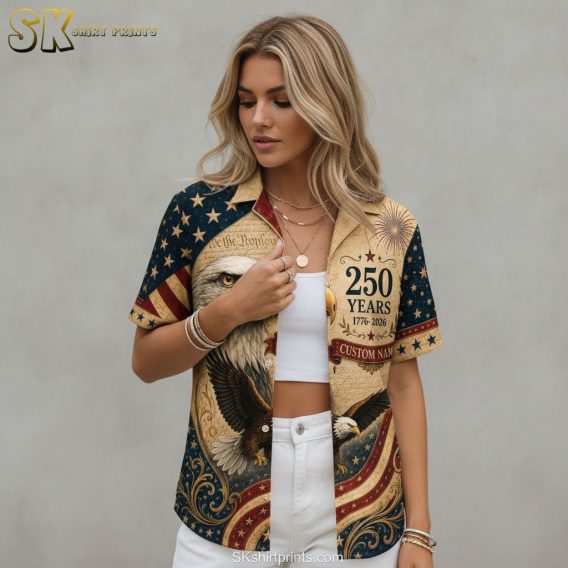 America 250 Hawaiian shirt displaying bald eagles, fireworks, ornate scrollwork, and patriotic star patterns in a red, white, and blue all-over print