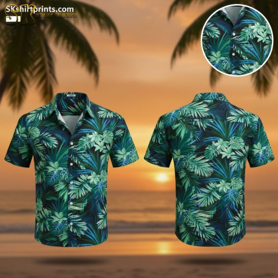 Black and green Hawaiian shirt featuring dense tropical leaf pattern in various shades of green and blue