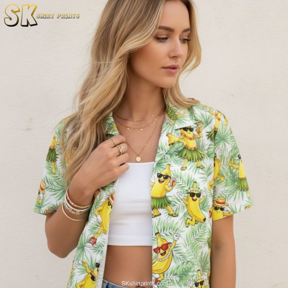 Black and yellow Hawaiian shirt featuring cartoon bananas with sunglasses dancing on tropical leaf print