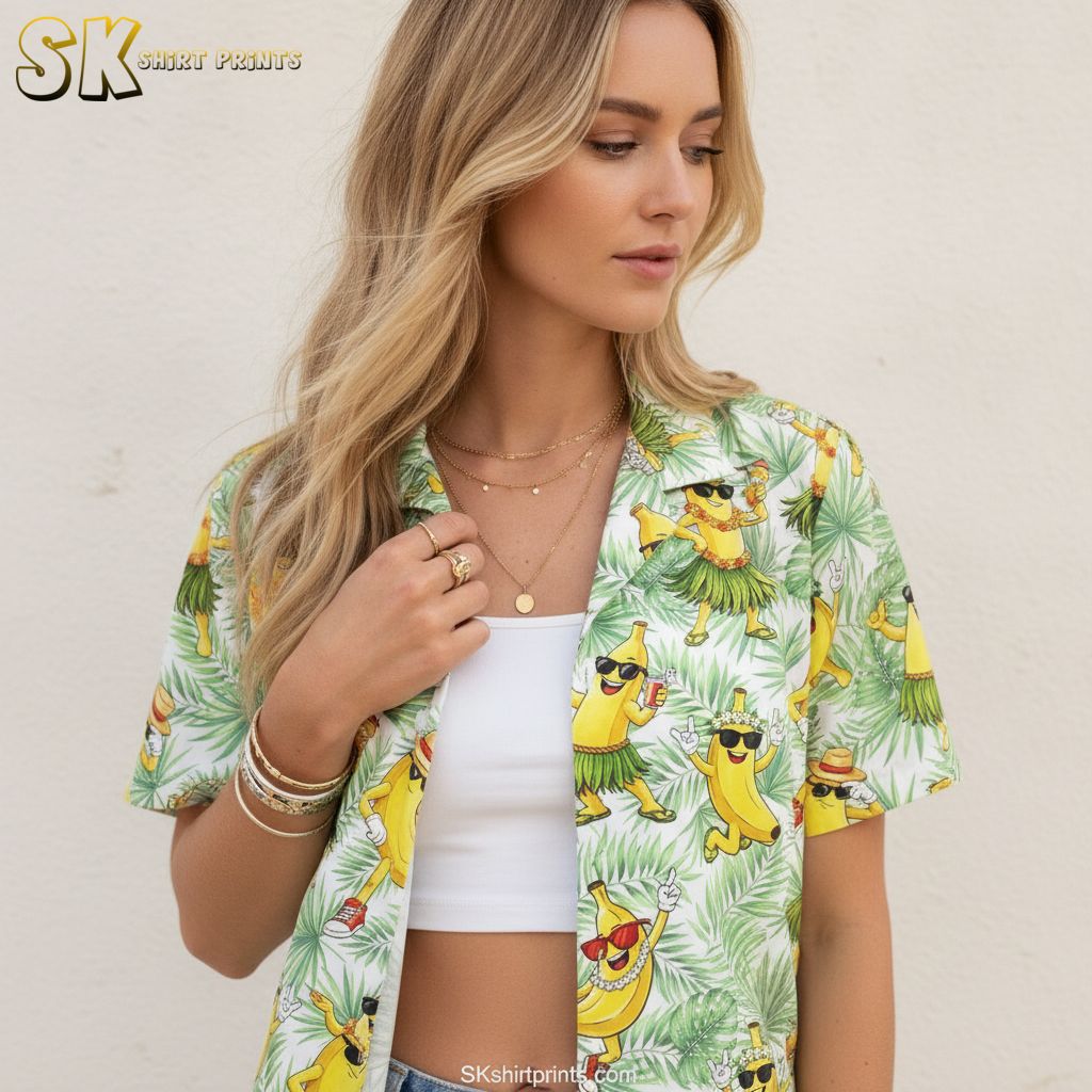 Black and yellow Hawaiian shirt featuring cartoon bananas with sunglasses dancing on tropical leaf print