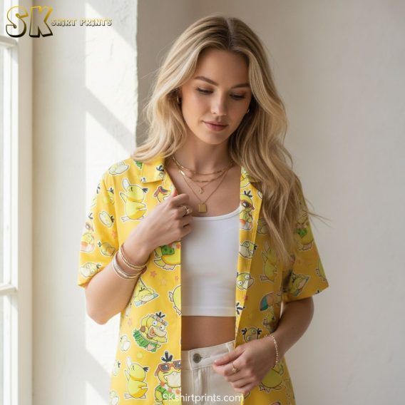 Black and yellow Hawaiian shirt showing cartoon duck characters with dark accent details on yellow background
