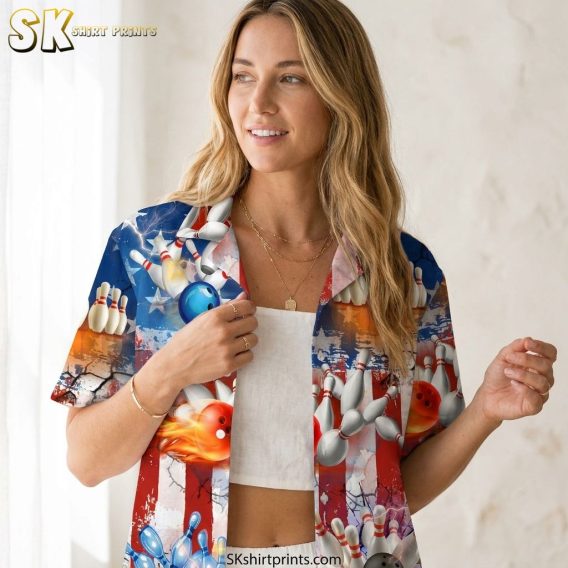 Close-up lifestyle photo of a bowling Hawaiian shirt worn by a female model, showing detailed bowling pins and balls pattern with red and blue American flag motif, stars, and flame accents