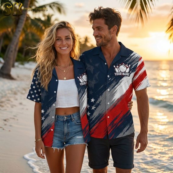 Couple wearing custom Hawaiian bowling shirts with stars and stripes and bowling ball and pins print, photographed in golden hour cinematic lighting showing the full color collection