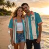 Couple wearing custom Hawaiian bowling shirts in multiple colorways during golden hour, showing the retro bowling pin front graphic and vintage sunset back print with personalized team name and bowling text.