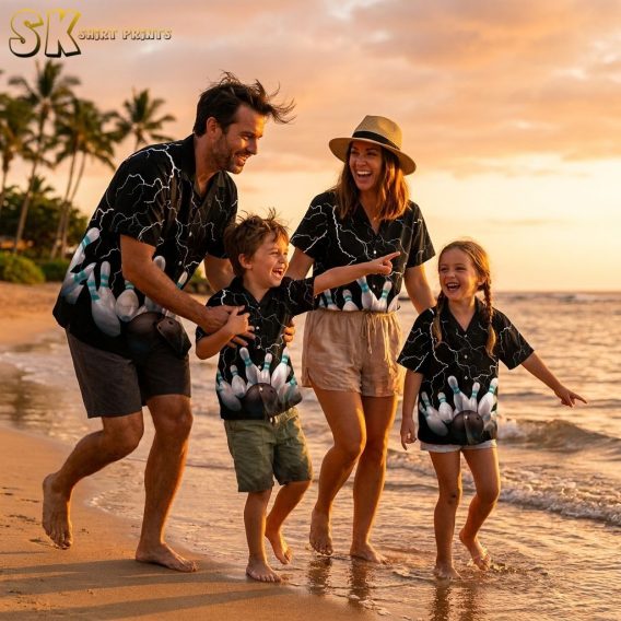Family wearing matching custom Hawaiian bowling shirts with black background, white lightning bolt pattern, and bowling pin graphic, photographed at golden hour on a beach.