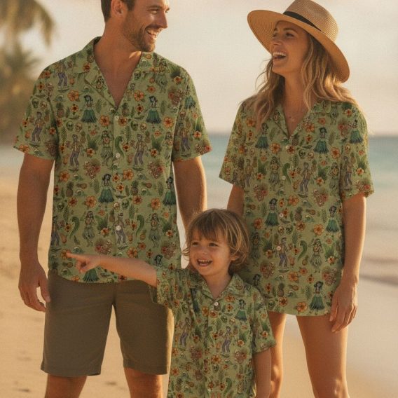 Custom Star Wars shirt with tiki statues, skulls, hula dancers, pineapples, and hibiscus flowers printed on a light green Hawaiian shirt
