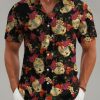 Galaxy Hawaiian shirt with yellow robot skull motifs and colorful floral print on a black background