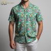 Green Hawaiian shirt displaying tropical flamingo and floral pattern with repeating design elements