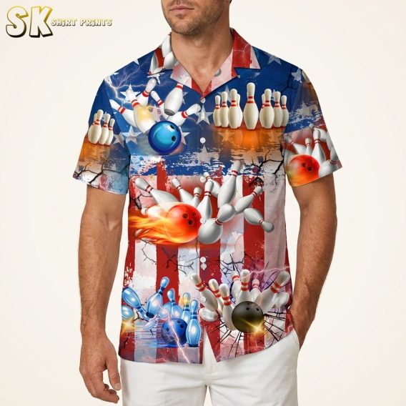 Hawaiian bowling shirt displayed on a male model in studio, showing bowling pins and balls pattern with red and blue American flag motif, stars, stripes, and flame accents