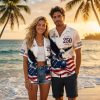 Collection of Hawaiian bowling shirts featuring patriotic eagle, American flag, fireworks, and stars print in red, white, and blue, worn by a couple during golden hour outdoor shoot.
