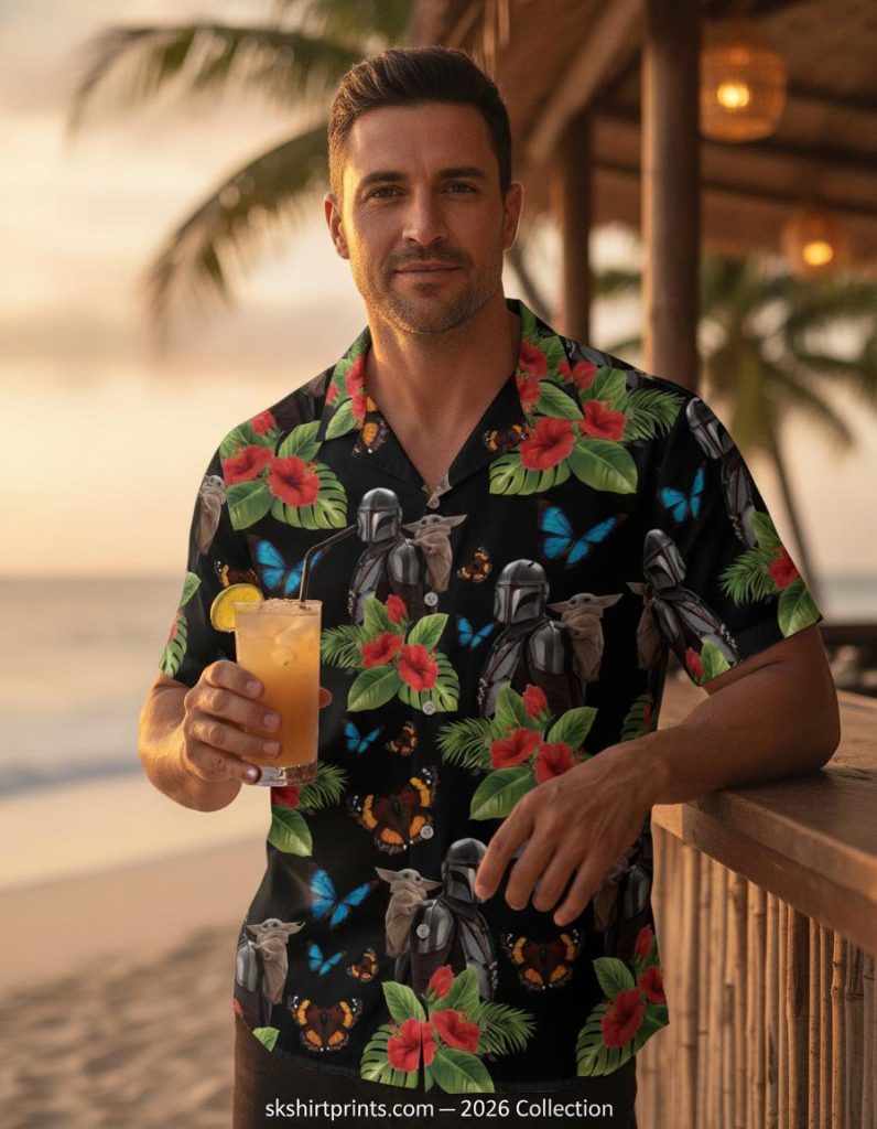 Men's Mandalorian Hawaiian shirt with Grogu hibiscus print laid flat on a tropical beach setting — Star Wars button down shirt