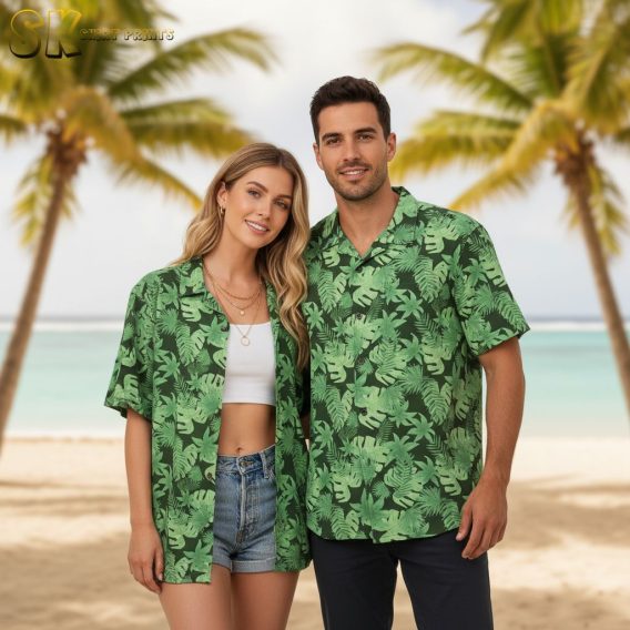 Men's green Hawaiian shirt displaying tropical leaf pattern with varied leaf shapes and sizes