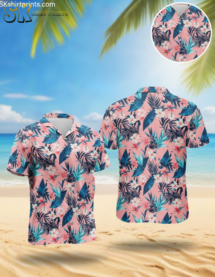 Men's pink Hawaiian shirt featuring white and pink floral pattern with blue and dark green tropical leaves